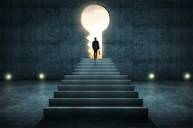 Man walking on stairs through Key hole shape opening on Wall